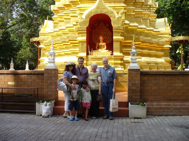 Chiang Mai, Thailand: Photo of whole Kent gang in front of a beautiful gold (not paint, but real gold leaf) shrine at a wat.