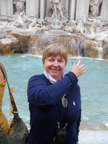 Joanne Westfall Bonanni Tossing A Coin In The Trevi Fountain In Rome.